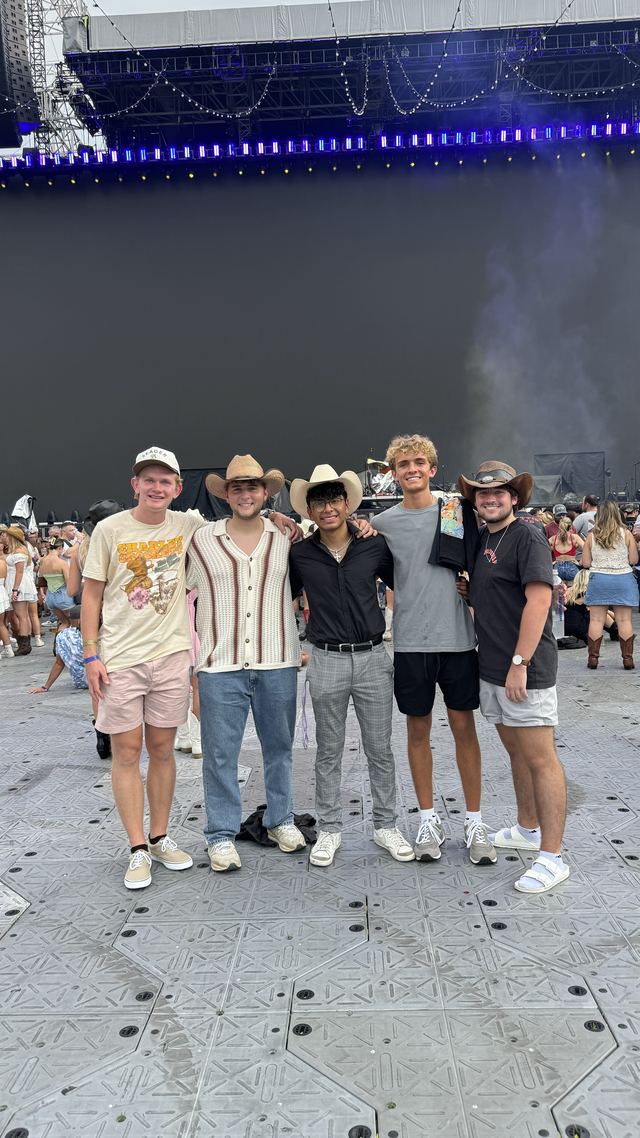 Tyler and friends at a country concert