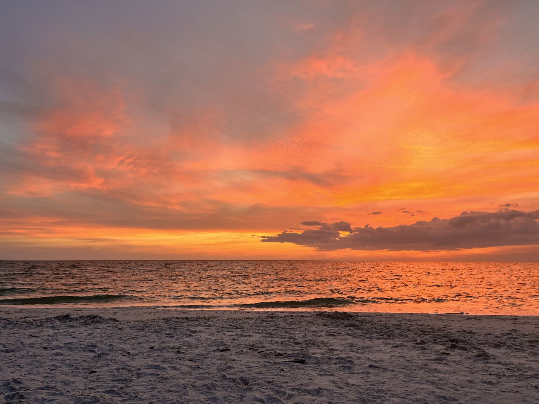 Vivid orange sunset over the Gulf of Mexico